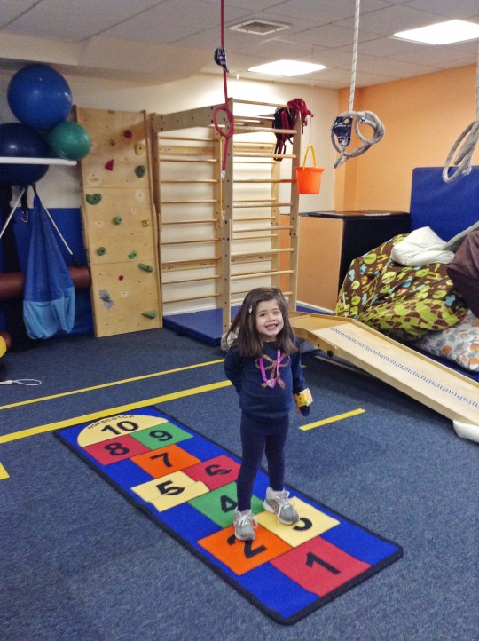 a girl enjoying therapy session